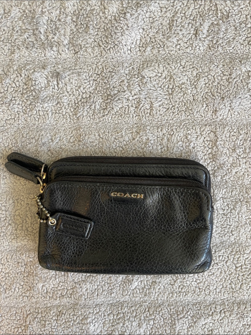 COACH Black Pebbled Leather Zip Wallet with Gold Logo